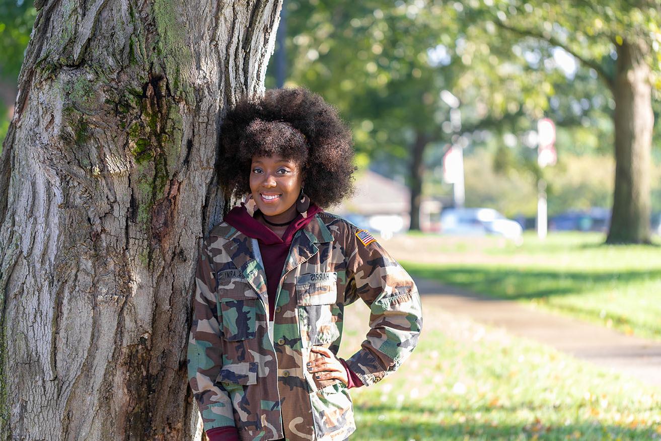 Erica Harris poses for photo on Browning lawn
